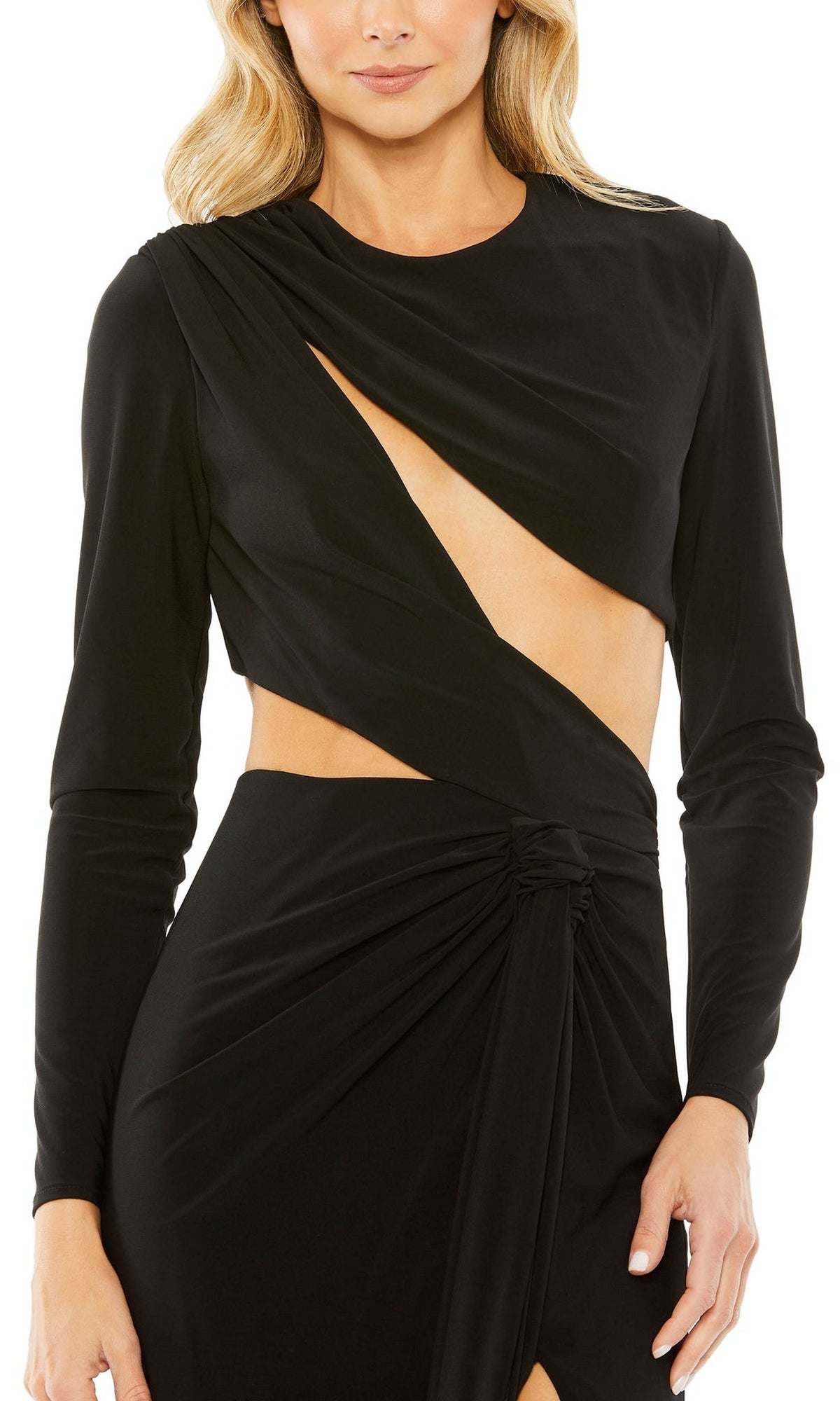 A woman wears the Mac Duggal 27426 Cut-Out Long Black Formal Dress, featuring asymmetrical chest and waist cutouts with gathered detail at the hip.